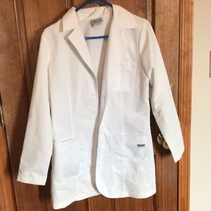 Greg’s anatomy lab coat never worn